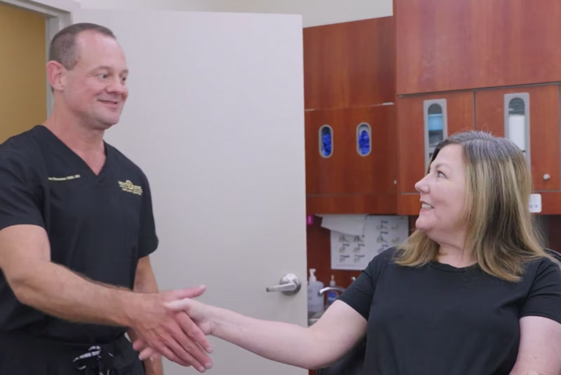 Dr Stevenson shaking patient's hand